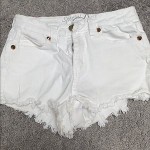 White cutoff jean shorts